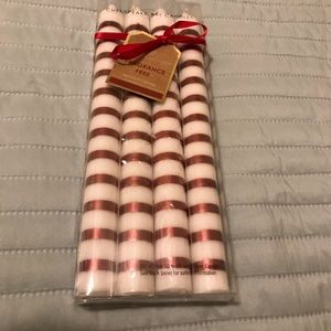 Box of striped taper candles